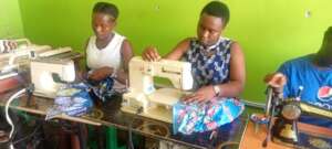 Tailoring lessons in progress at the workshop.