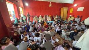Students and families gather for result day at Bright Hope School, Azad Town