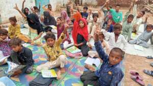 Open-air learning session at a brick kiln
