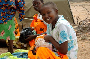 Young girl with baby