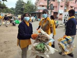 Students clean as a community service project.