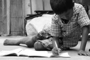A student captures a child studying.