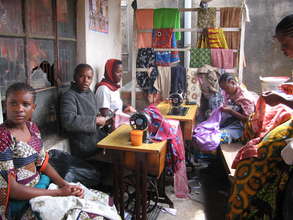 Raheli's veranda with sewing students
