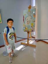Student with a painting