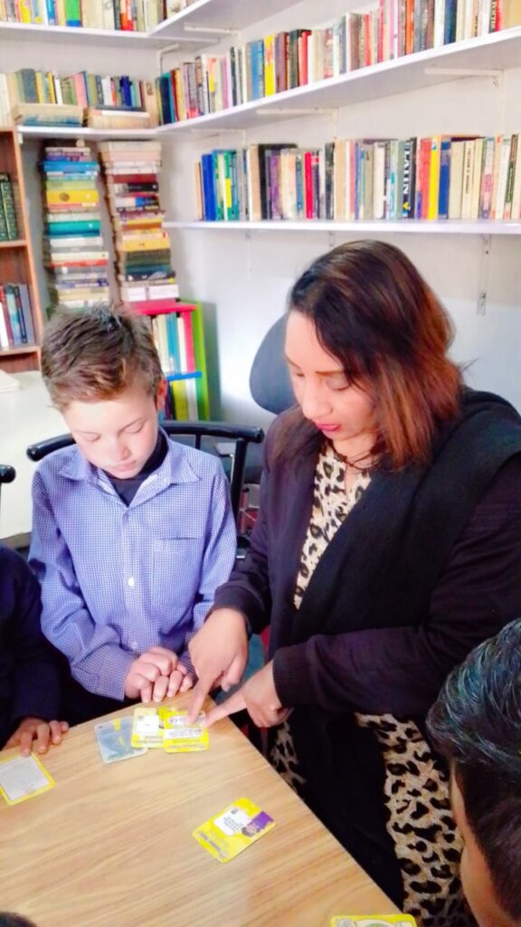 One-on-one guidance, a facilitator helps a student