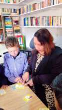 One-on-one guidance, a facilitator helps a student