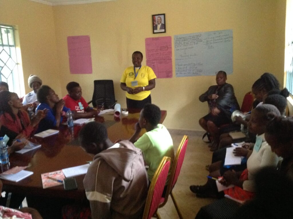Gladys listening to teen mothers' aspirations