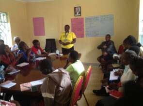 Gladys listening to teen mothers' aspirations