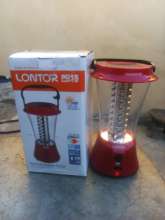The LANTOR solar lantern that is tested by girls.