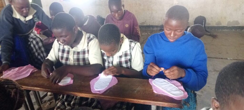 School Girls making their reusable sanitary towels