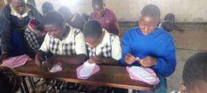 School Girls making their reusable sanitary towels