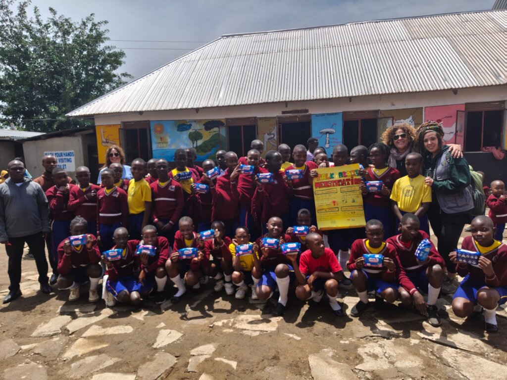 Girls happy after receiving sanitary pads