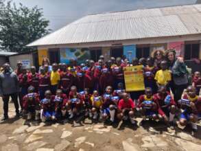 Girls happy after receiving sanitary pads