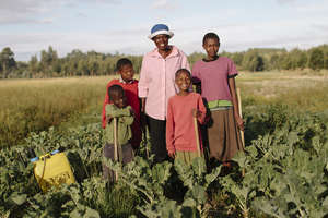 Nancy and her kids at the Farm