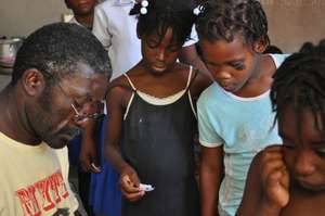 The orphanage director helping out
