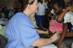 Nurse Lauren checking for worms