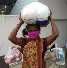 A Lady Who Lost her Daily Wage Labor Received Aid