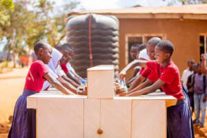 students enjoying water