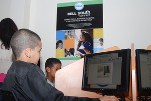 A child using the computer in the media room