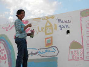 Asmae expressiong herself through free painting