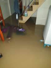 Flood waters from front door and under the floor