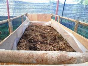 Vermicompost bin containing redworms and scraps