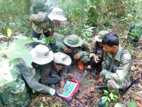 Community rangers identifying snare hot zones