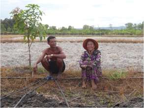 Nak Sok and his wife on their farm
