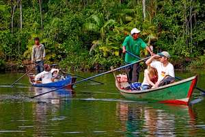 Guides take tourists on a river rour