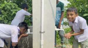 Happy Students using clean water