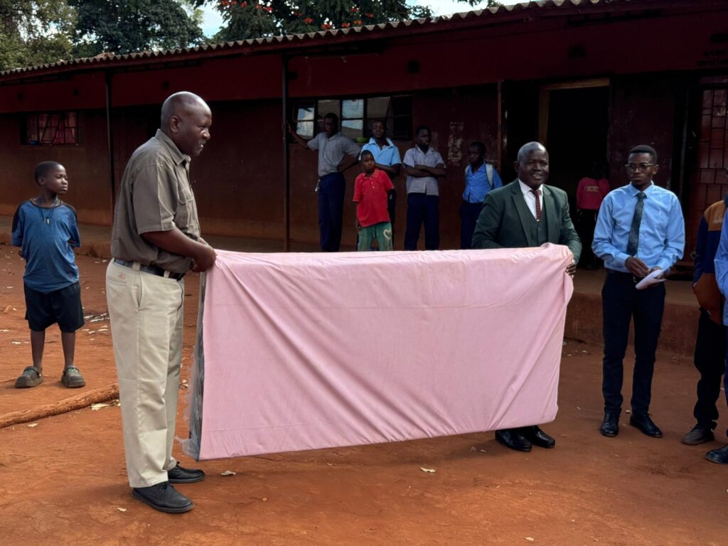 Mattresses being received by the school