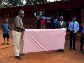 Mattresses being received by the school
