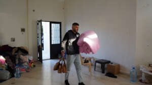 Distributing Blankets for displaced people