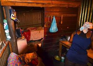 Tyron's mother in their home