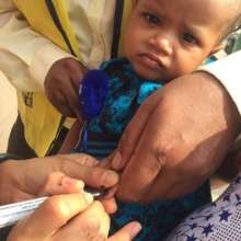 Purple pinkies show the child has been immunized