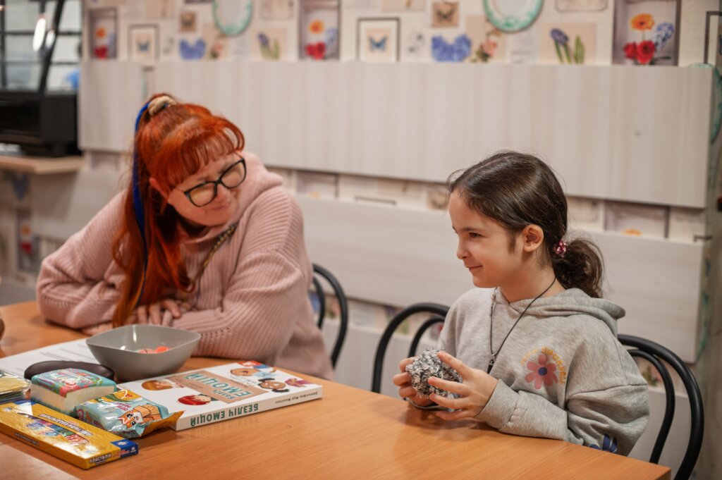 Blind children in the warm palms of art
