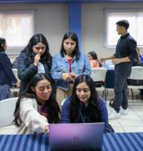 Students collaborate on an online project.