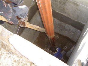 Pit latrine being built