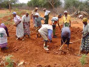 The Community Begins to Make Bricks