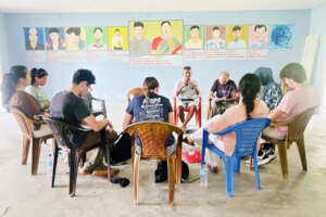 ..... with survivors and photos of the missing...