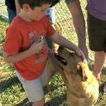 Adoptable dog Charlie meets his new family
