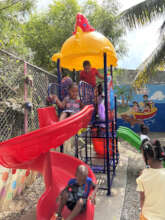 Children playing at the new park