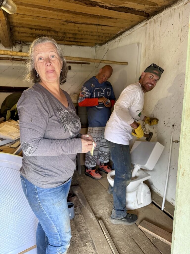 Installing the new toilet and shower