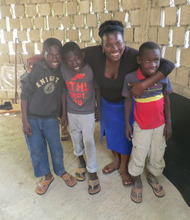 Jolina gives shoeless boys new sandals