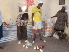 The women feeding the chicks