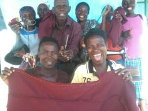 Women Making A School Uniform