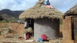Tendai Standing Infront Of Her Hut