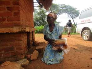 Our team distributing bread to needy families