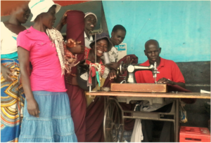 Women Ecstatic To Receive Sewing Material