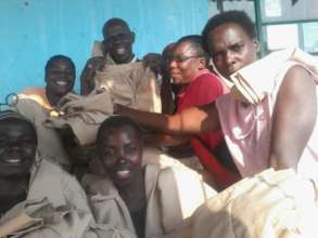 Women Showing The Scout Uniforms They Made